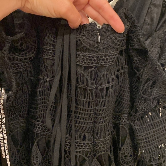 Long-sleeve off shoulder, Black Crochet Romper with tie straps down the back - Picture 5 of 11